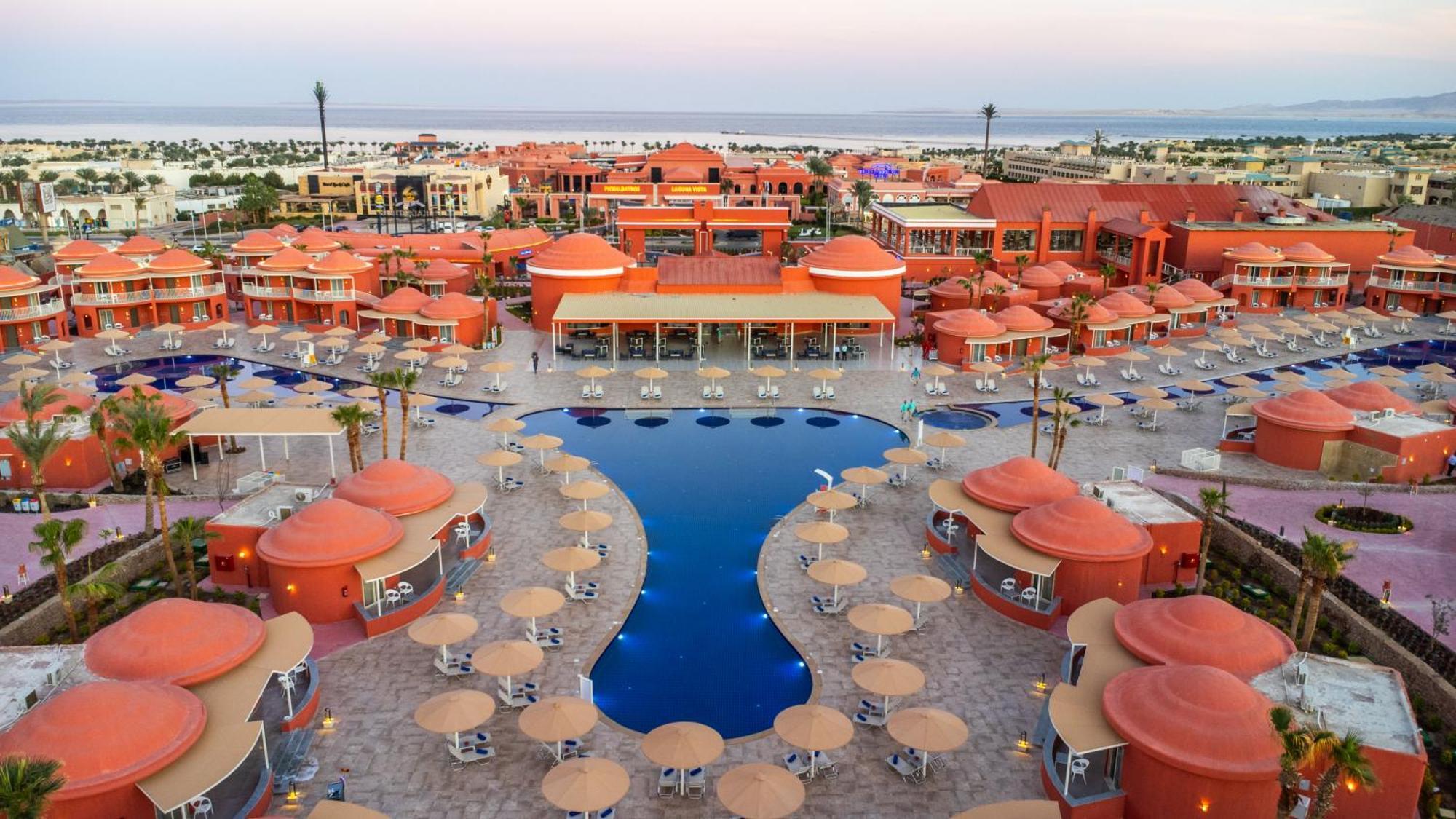 Pickalbatros Laguna Club Resort Sharm El Sheikh Exterior foto The resort at sunset